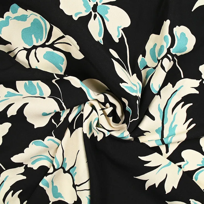 Crêpe viscose imprimé fleurs écru et bleu fond noir