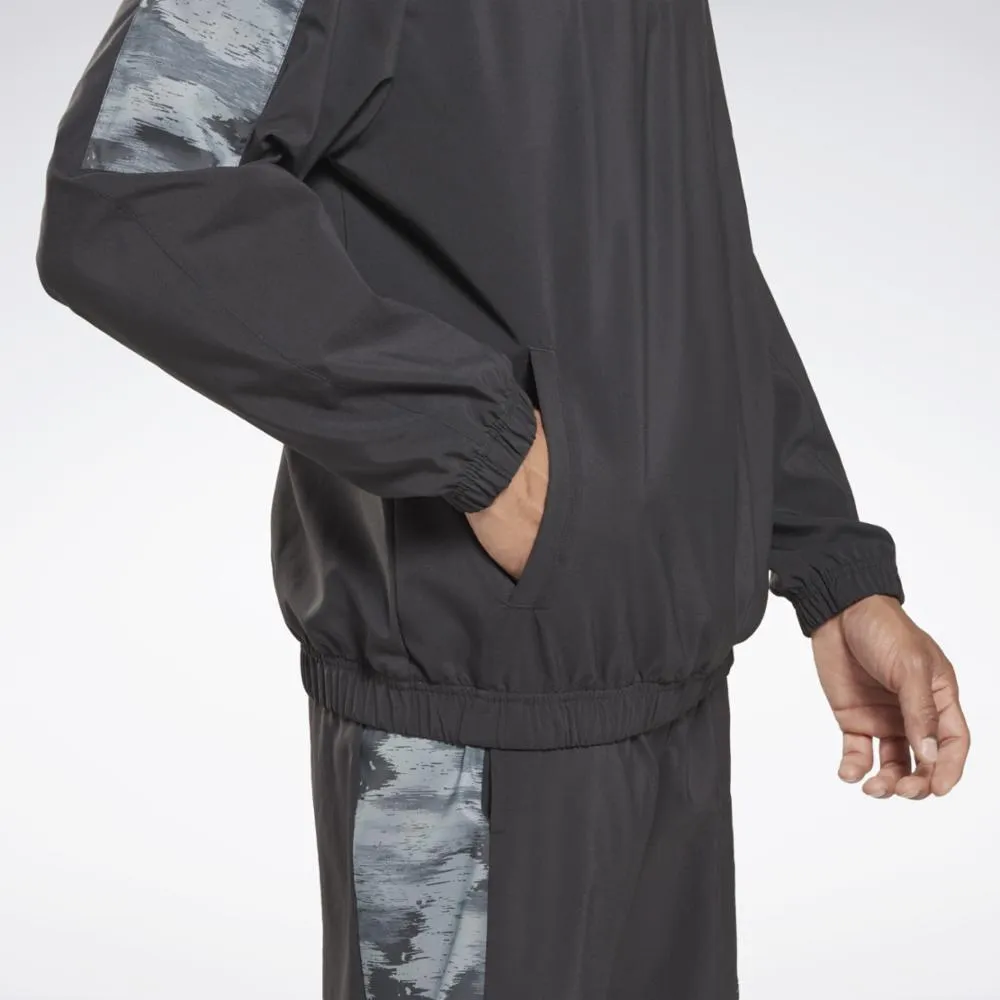Reebok Apparel Men Training Camo 1/4 Zip Long-Sleeve Top NGHBLK